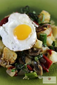 Potato asparagus hash with sunny side up eggs